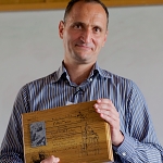 Zoltan Nusser receives oak and slate plaque
